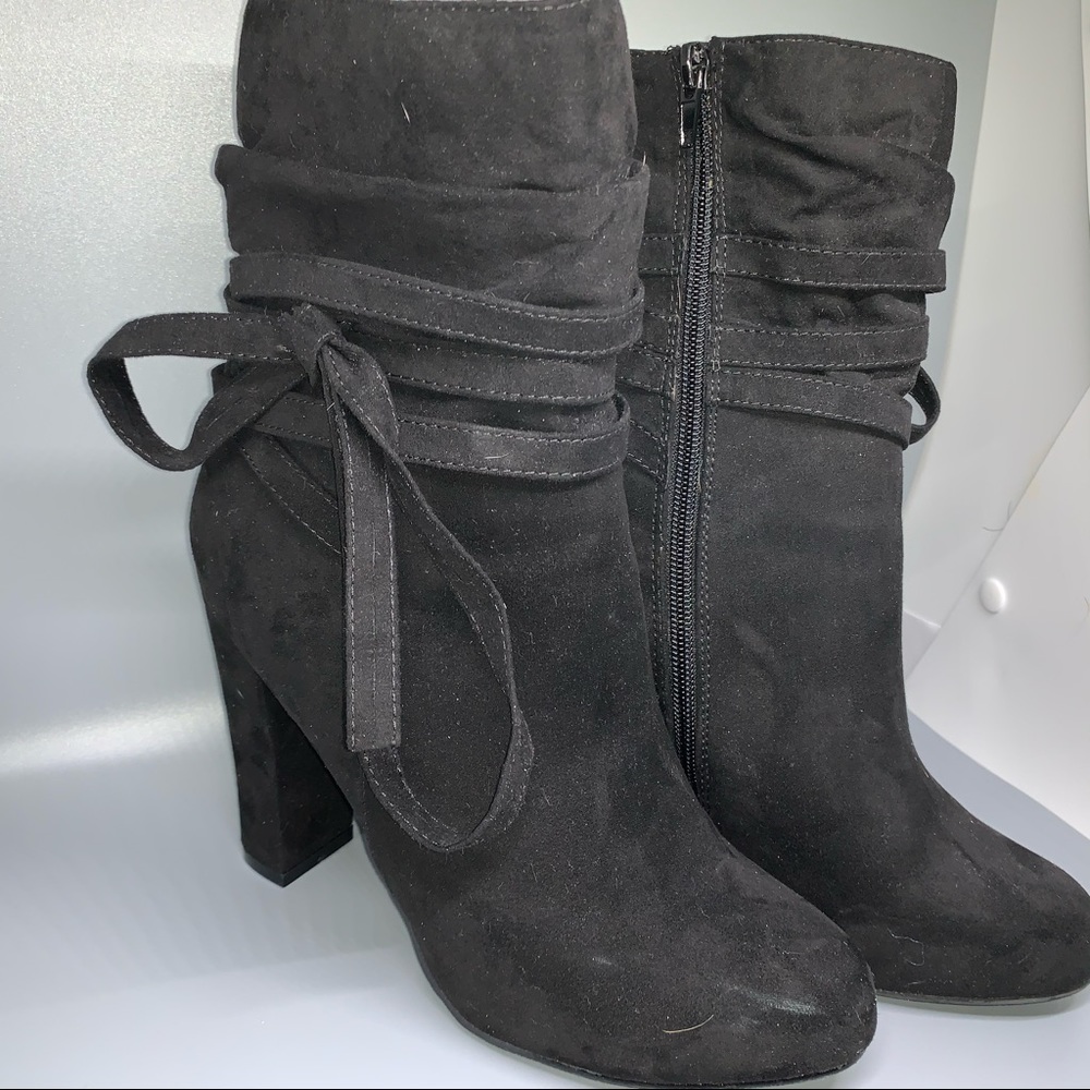 Black faux suede heeled boots.